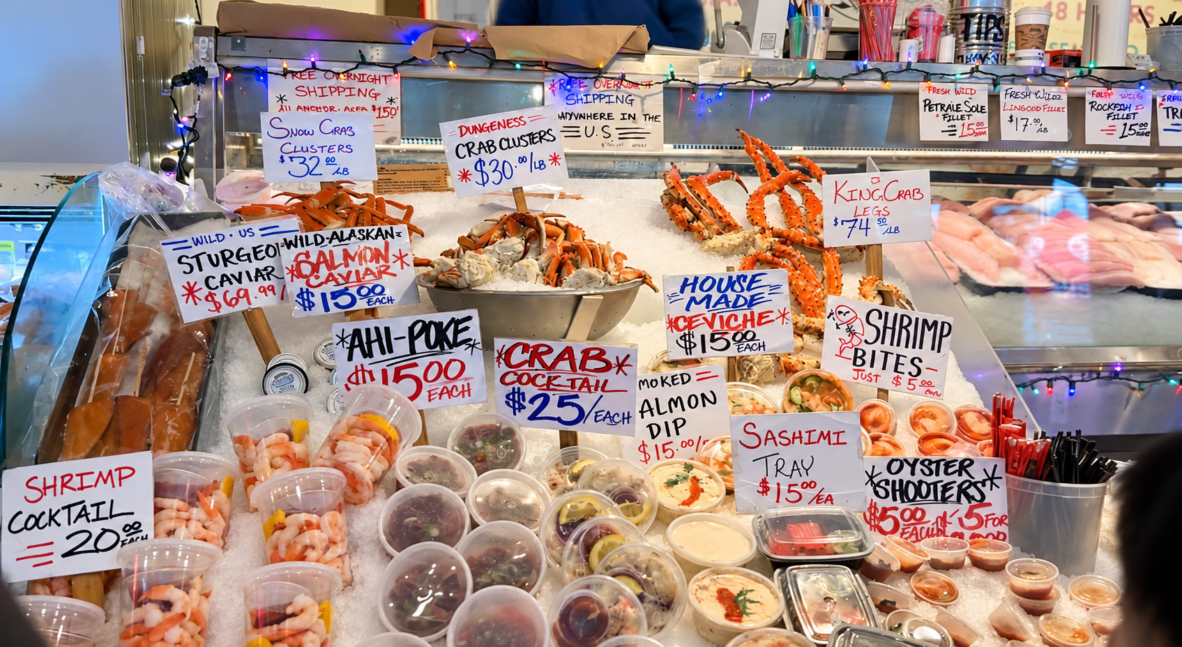 Crab clusters and seafood displayed at Pike Place Market