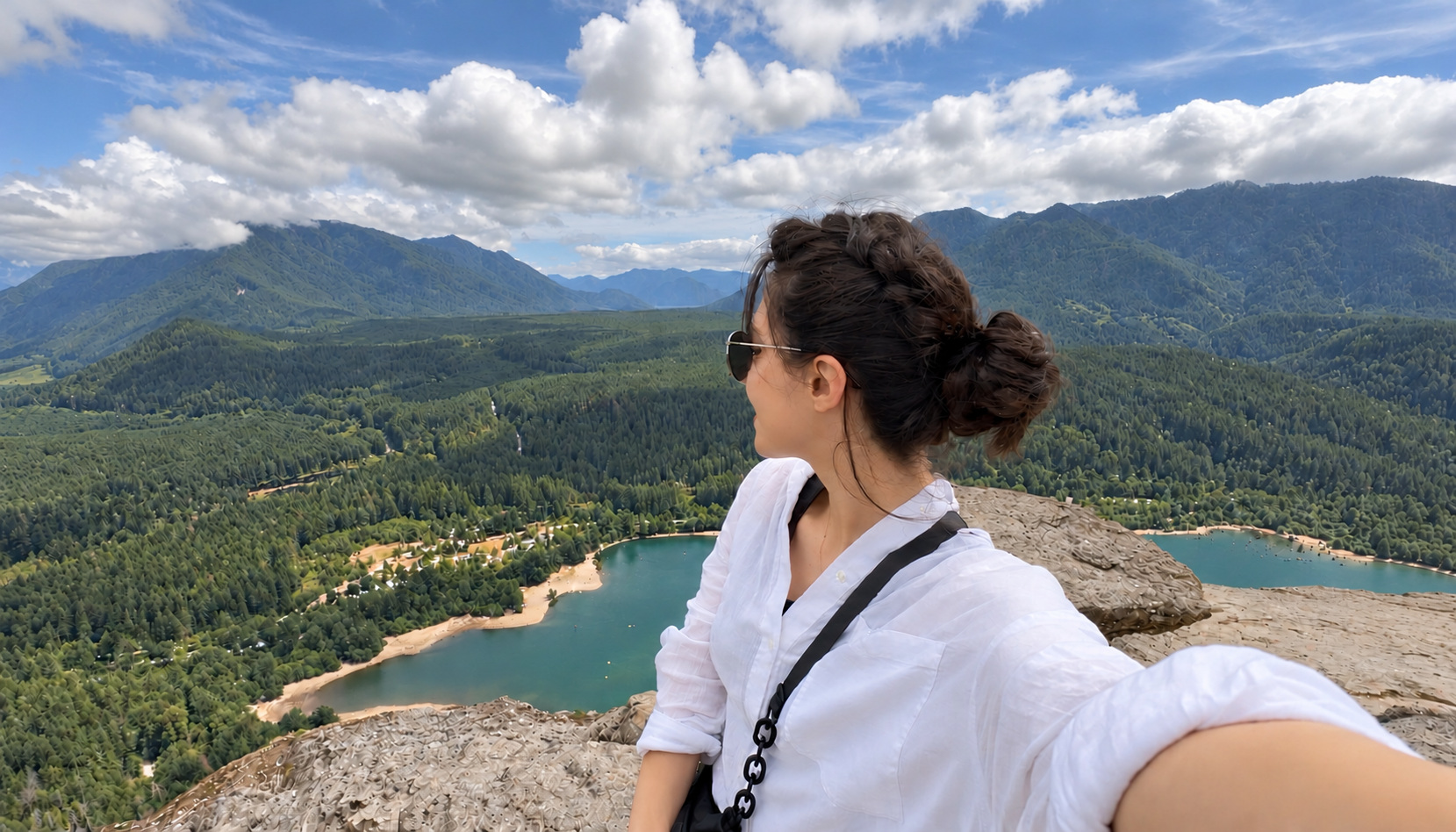 Ranya at Rattlesnake Ledge overlooking the lake and mountains