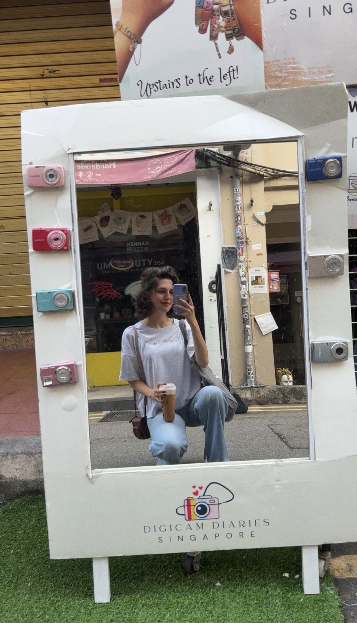 Ranya outside a Singapore cafe