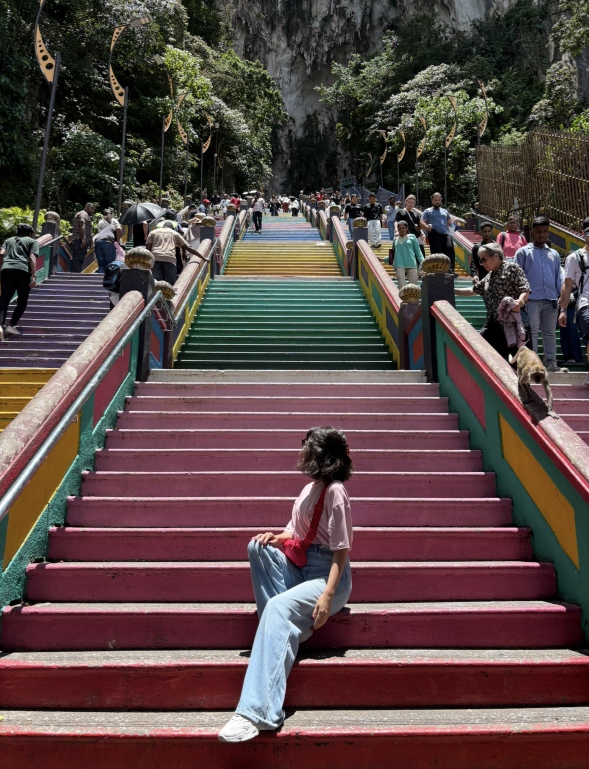 Ranya on the colorful Batu Caves steps