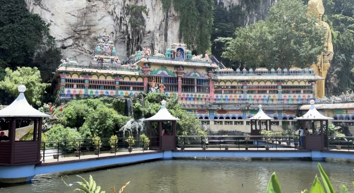 Temple and pond at Batu Caves