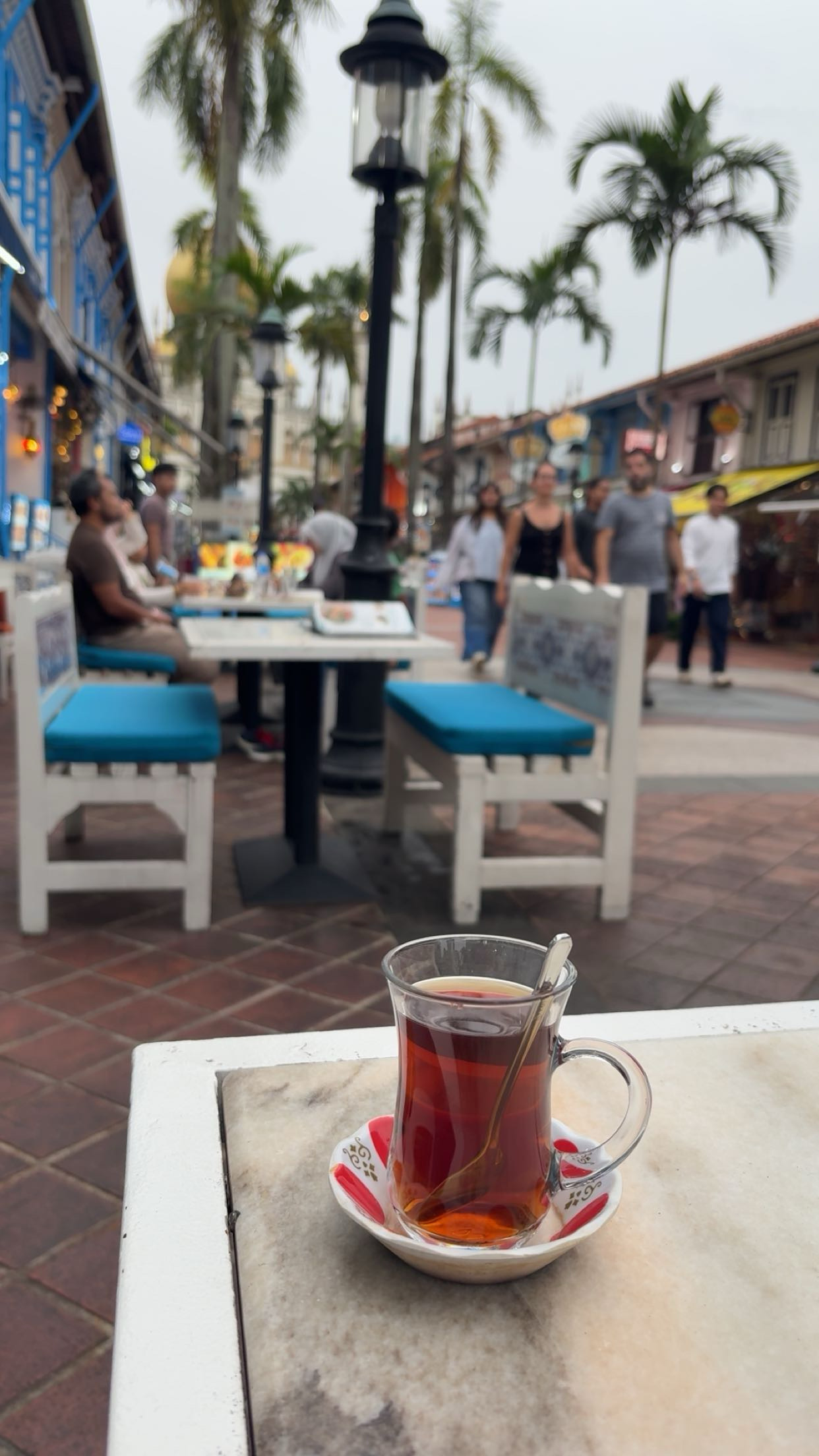 A glass of tea at an outdoor cafe in Singapore