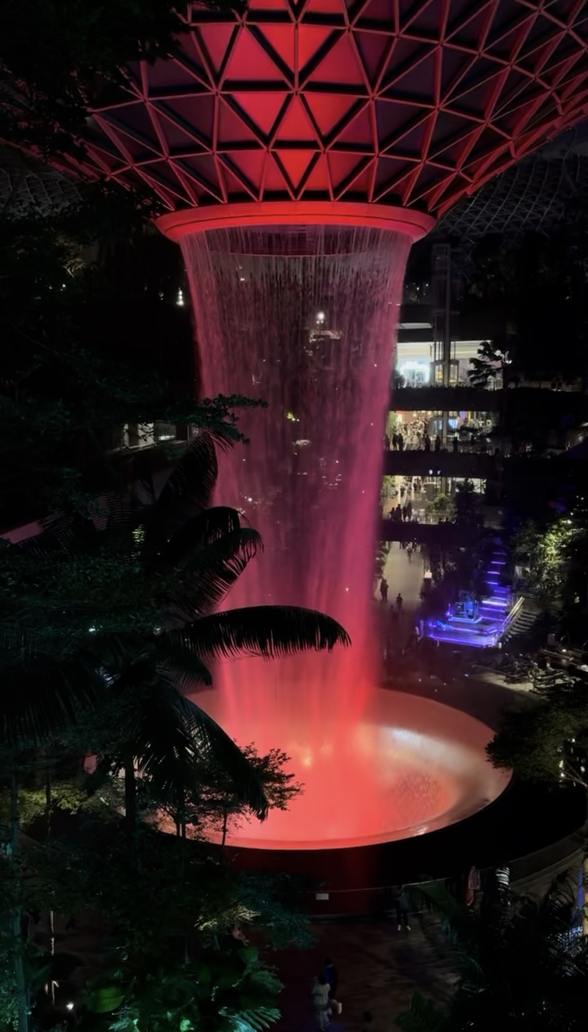 Jewel Rain Vortex glowing red at night